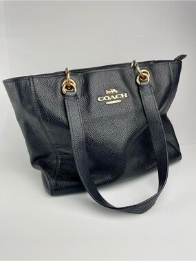 Coach Jes Black Pebbled Leather Tote featuring polished gold-tone hardware